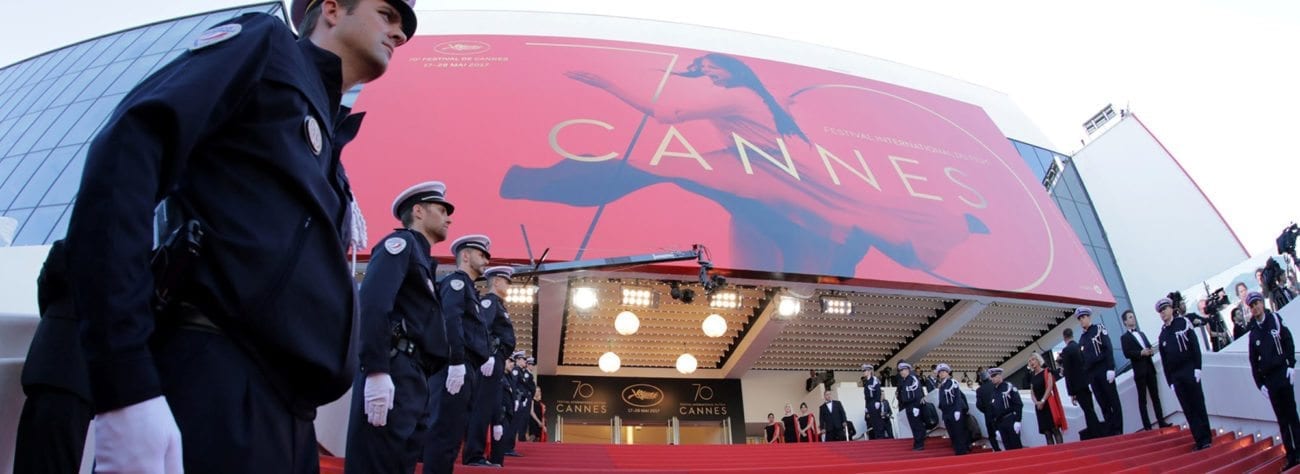 Time to get those “offended” caps off the shelf, folks, because the official 2018 Cannes Film Festival poster is out and no doubt it’s about to cause an uproar of Biblical proportions.