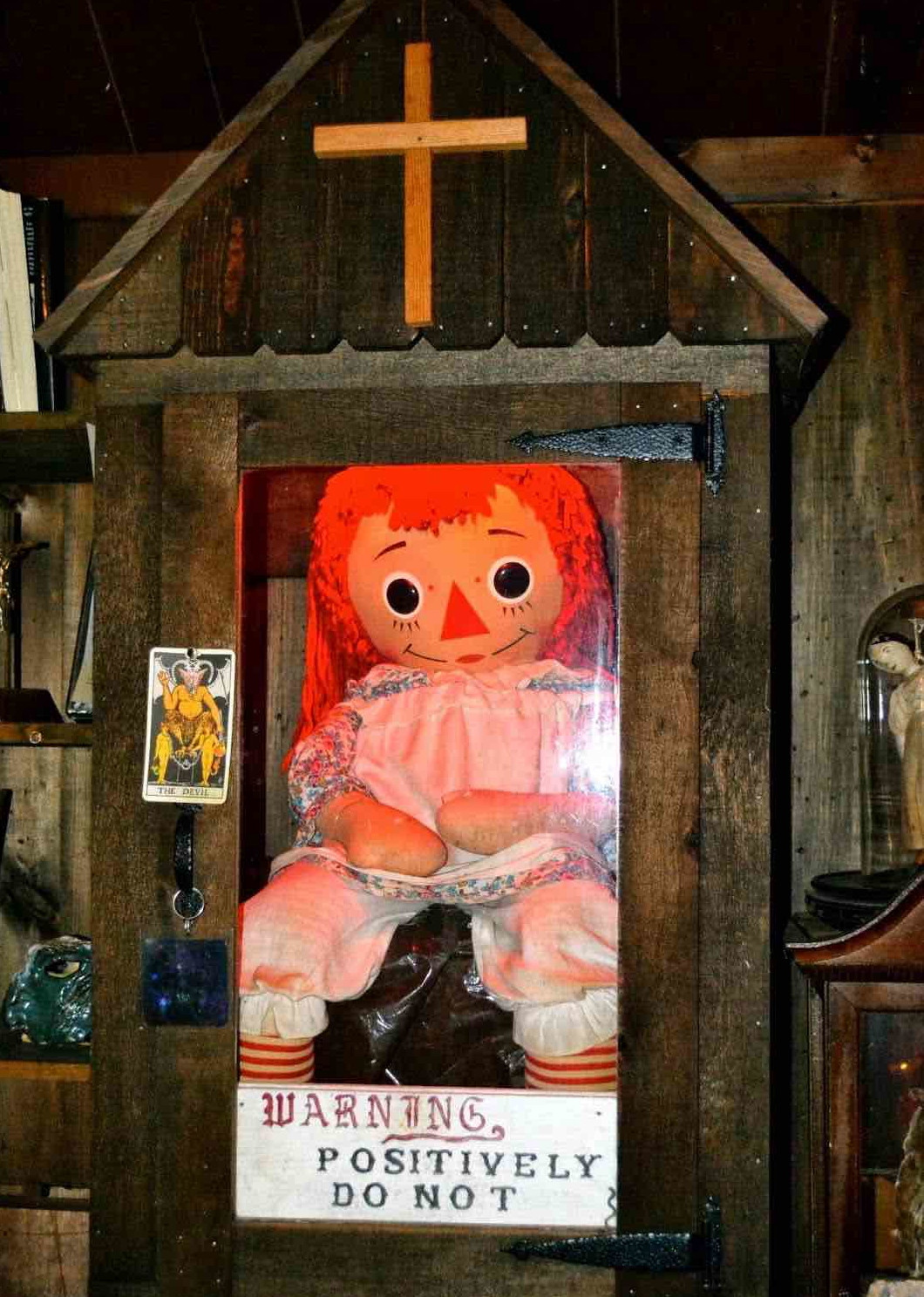 You may have been terrified by 'Annabelle', but what's even scarier is that she's a real doll. Learn more about the haunted doll and her crimes.