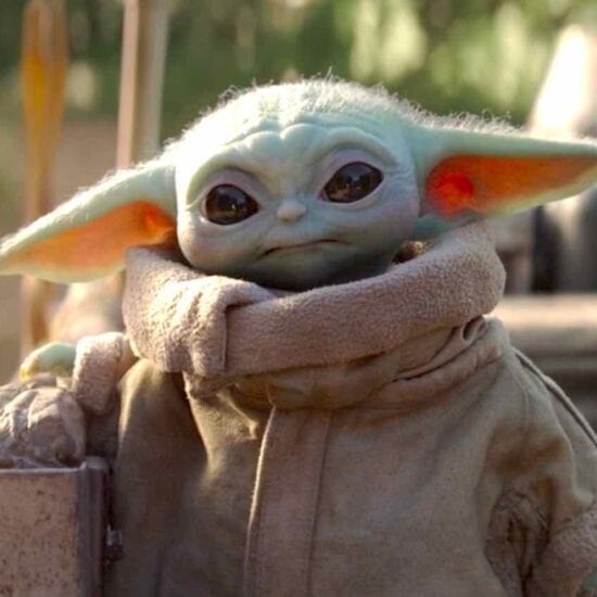 Baby Yoda smiling: See why it's the cutest Christmas tree topper ever ...