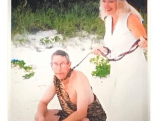 Carole Baskin's wedding photo is obviously unusual. Poor Howard doesn't look like he's having fun being on a leash in a caveman costume.