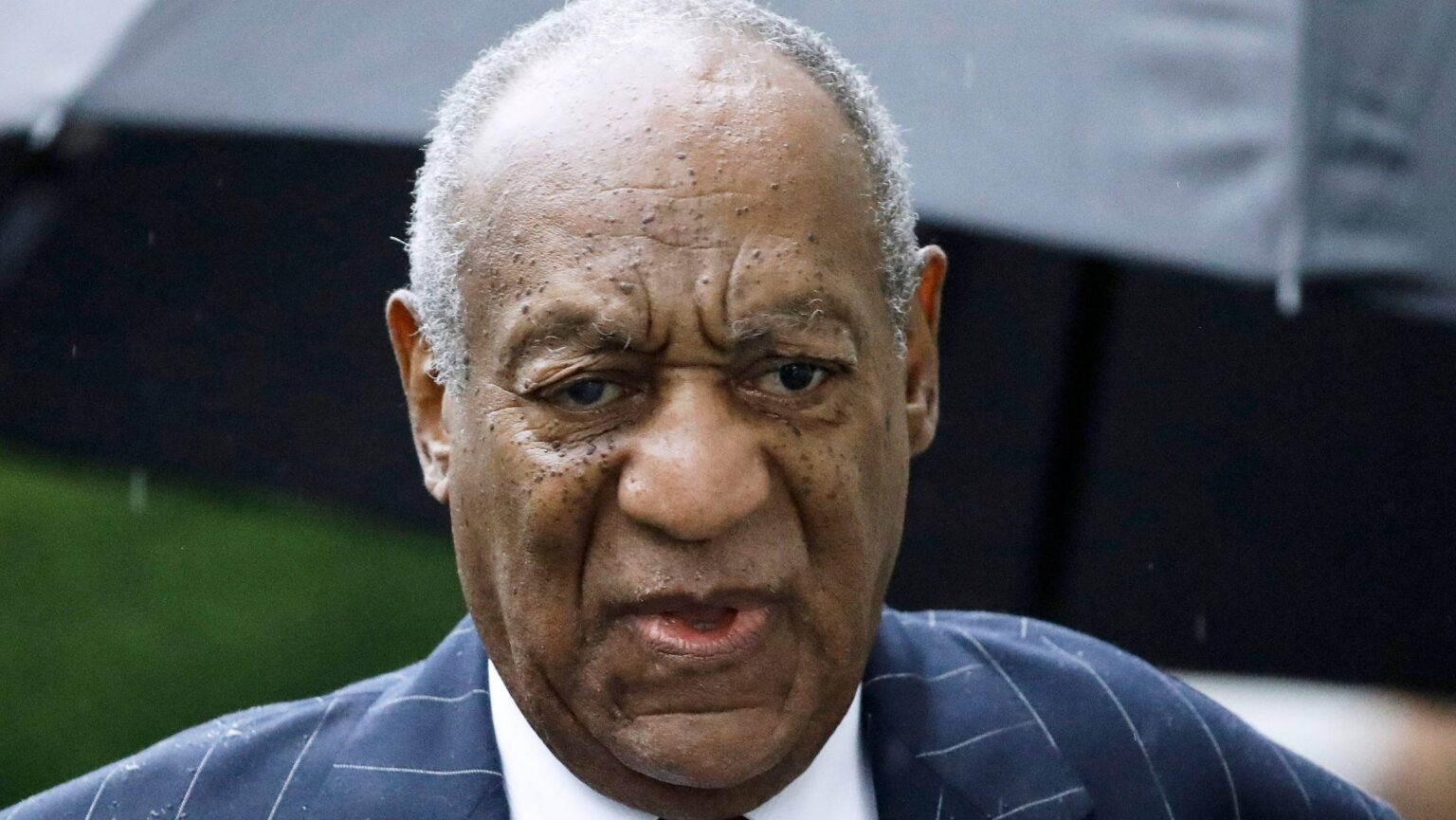 A new mugshot of infamous actor Bill Cosby shows him smirking. It looks like the face of a man who doesn't regret his crimes or sentence.