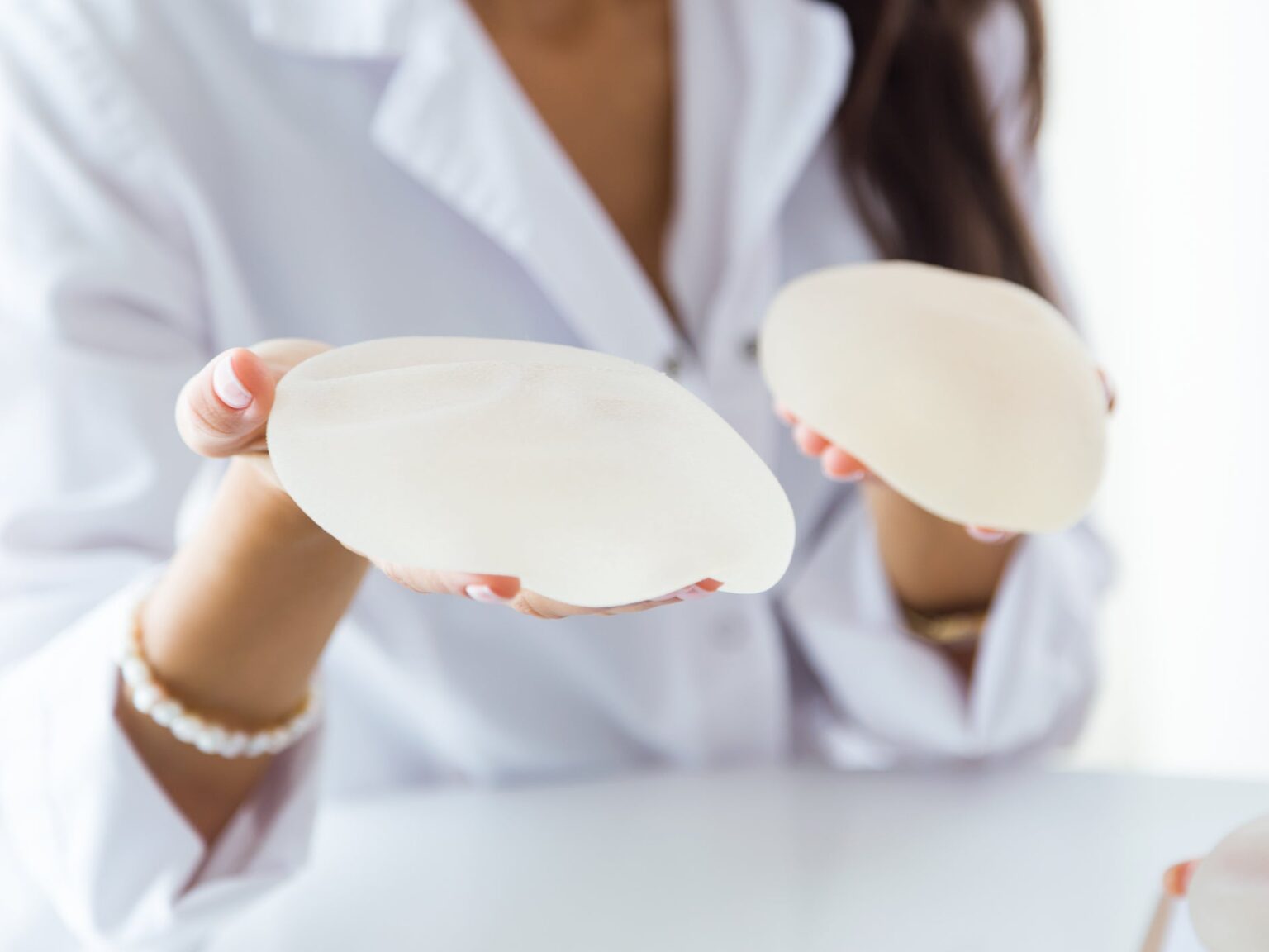 If you’ve ever considered getting breast implants then maybe you should wait. Could this illness be caused by an implant?