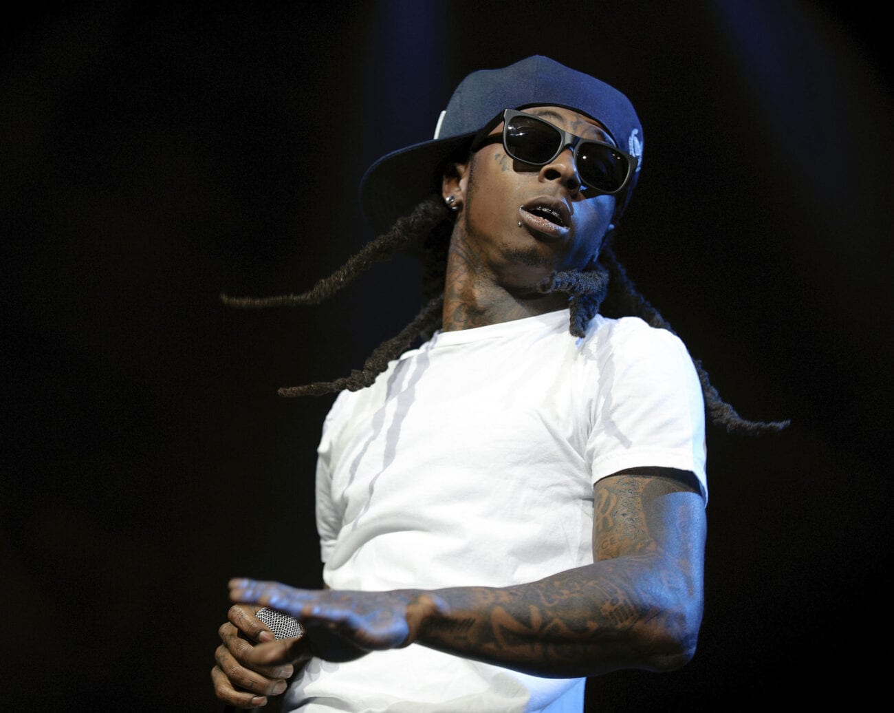 Hip-hop superstar Dwayne Carter, AKA Lil’ Wayne, AKA Tunechi is no stranger to indictment. How has his latest crime impacted his net worth?