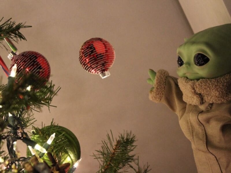 The smiling baby Yoda is the hottest Christmas tree topper in 2020. See how 'Star Wars' fans celebrate the holiday season with baby 'Grogu'.