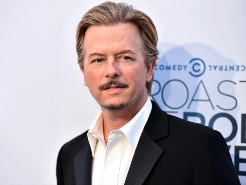 Hollywood comedy star David Spade is set to host the upcoming 'The Netflix Afterparty.' What does this mean for his net worth?
