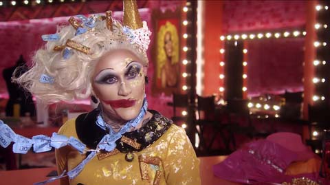 COVID-19 has left a nasty scar in the werkroom, and this week's eliminated queen from 'Drag Race UK' isn't helping. Get all the tea from her here.