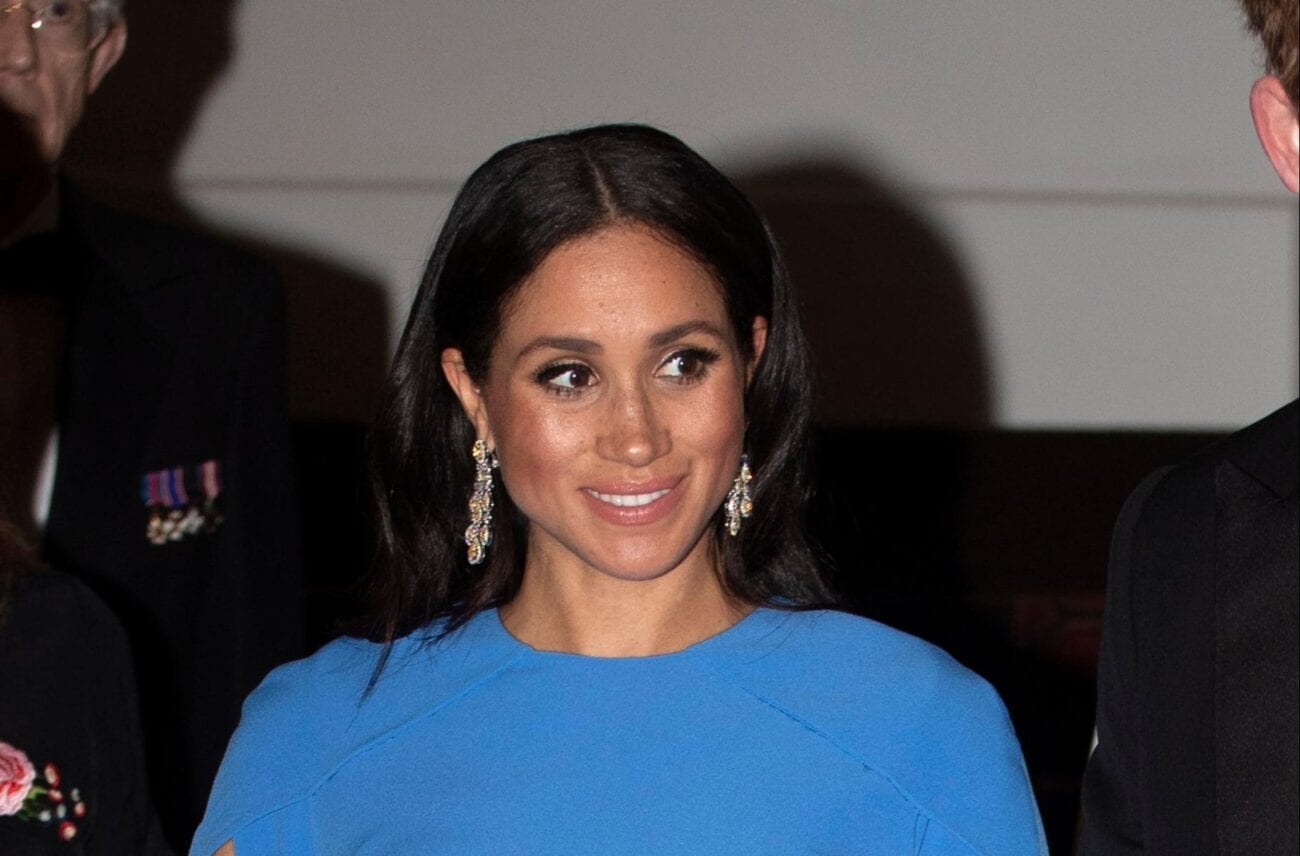 Did Meghan Markle wear the wrong earrings two years ago? The answer is more sinister than you (and Prince Harry) could imagine. Read about the allegations!