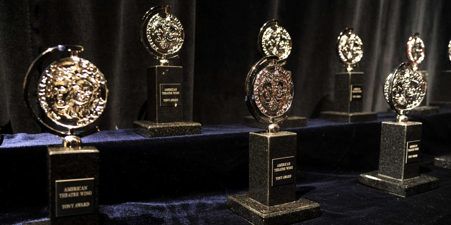 It's been a while, but the Tony Awards are finally back. Why is the broadcast split in two though? Grab a program and learn about CBS's new strategy!