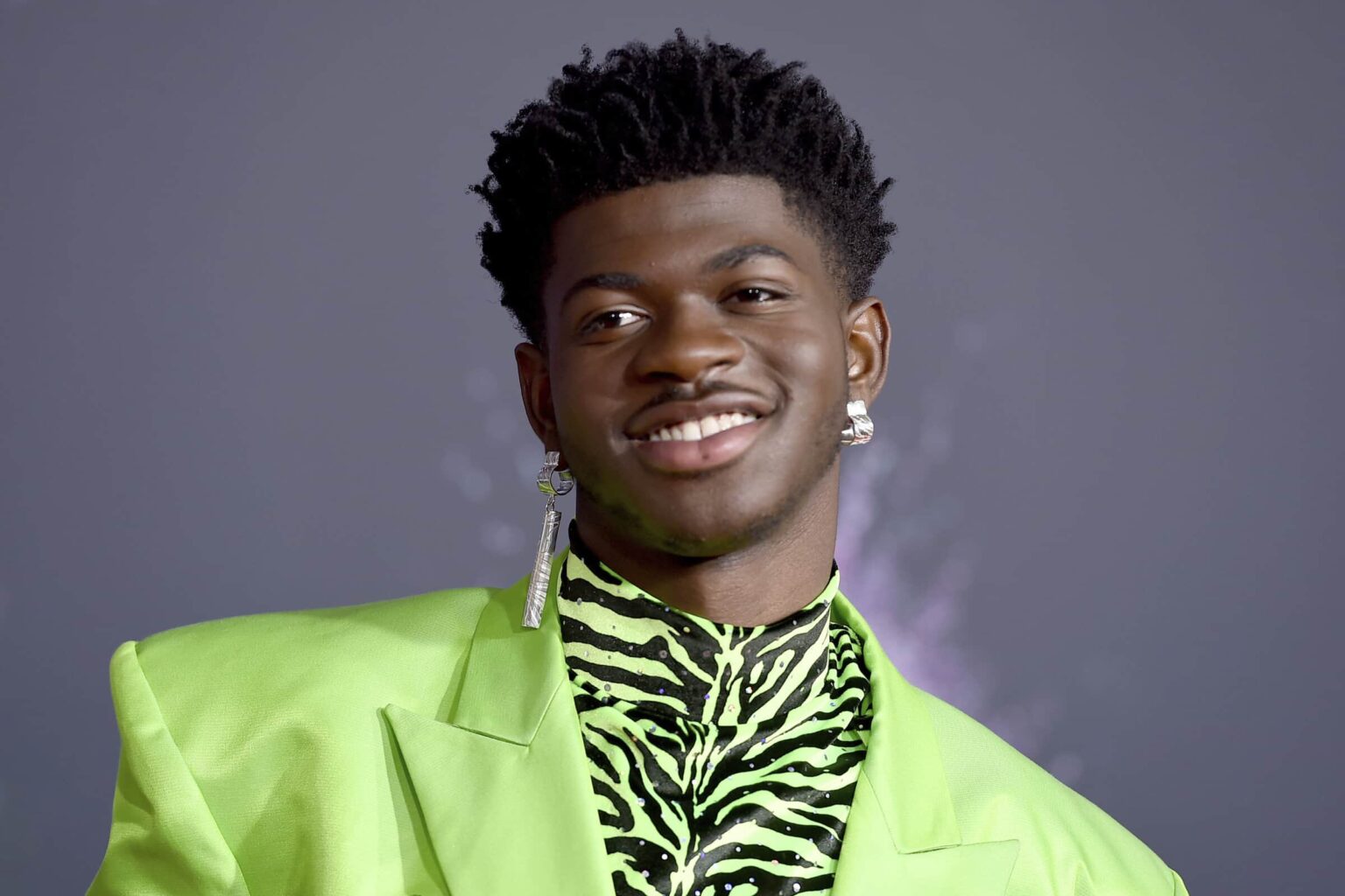 Lil Nas X seems to be in the midst of a personal renaissance in 2021. With his career beginning to boom, see his net worth and check out his latest songs!