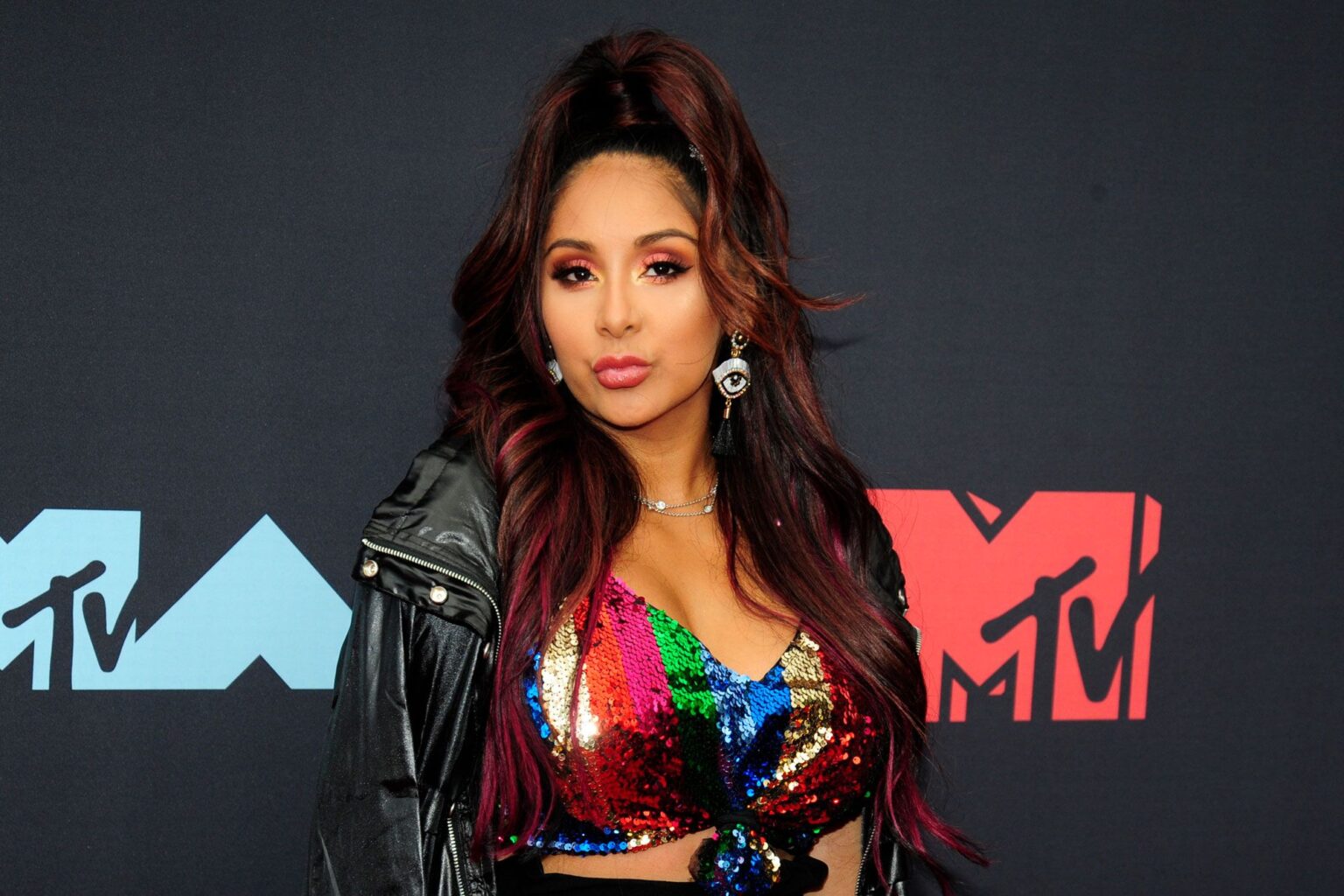 Snooki is offically back on 'Jersey Shore: Family Vacation'! Relive Snooki's wildest moments on the show before the shore gang returns this June.