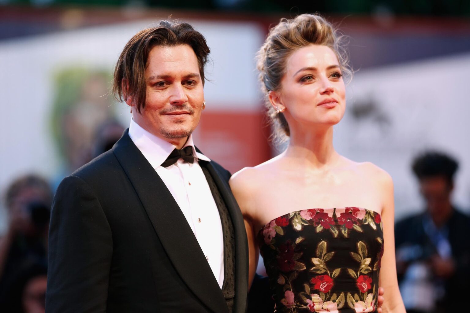 Amber Heard is officially a mama, revealing to the world her surprise on Instagram. However, is Johnny Depp the baby's father? Let's delve in.