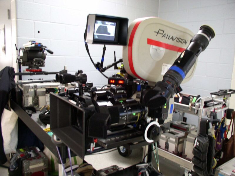 a researcher uses a video camera to record