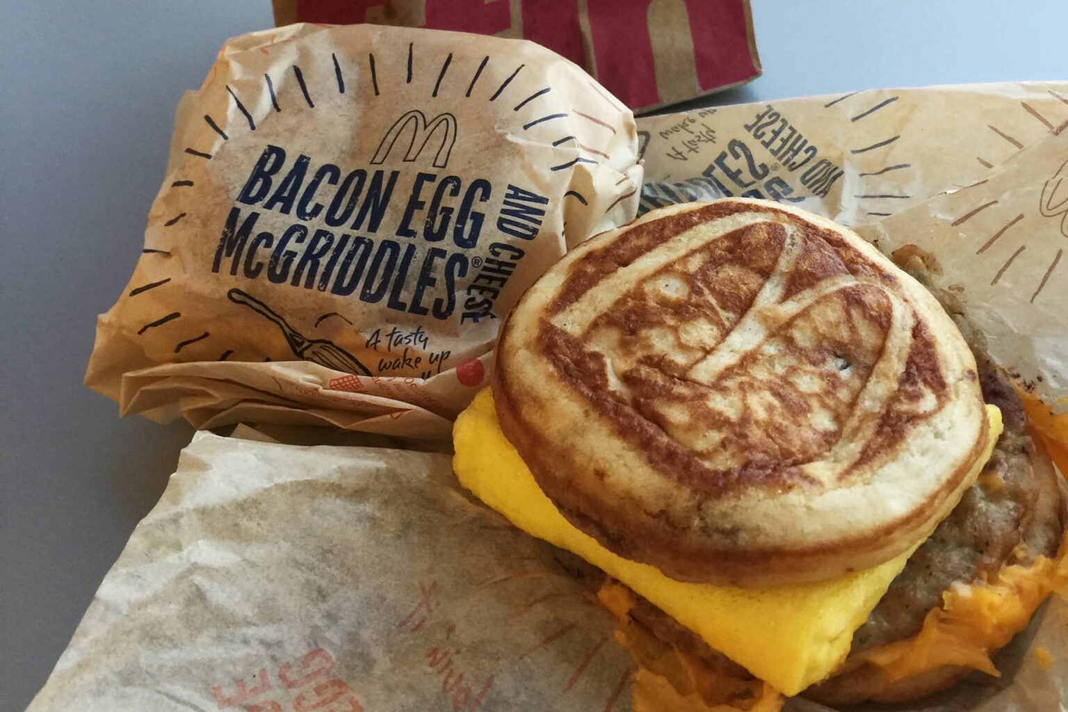 Today, thousands of people started their day debating which is better, the egg McMuffin or the sausage McGriddle. See the best tweets on the divisive poll.