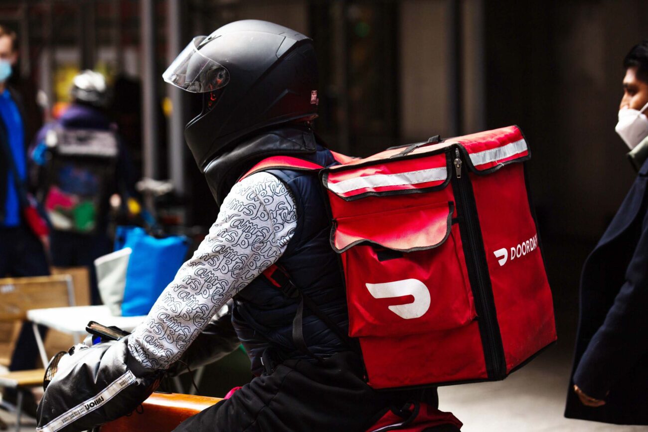 DoorDash is suing New York City for the second time this week! Learn all about why the food delivery app is at war with the Big Apple here!