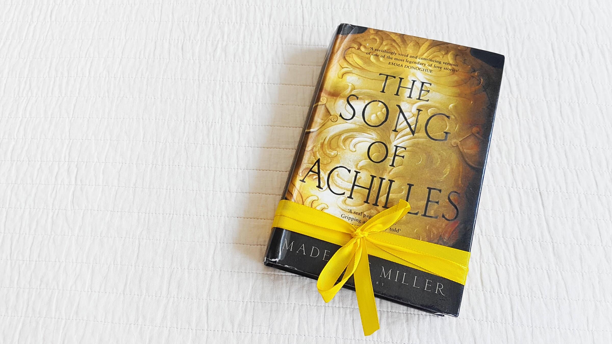 He gives books to us. The Song of Achilles книга.