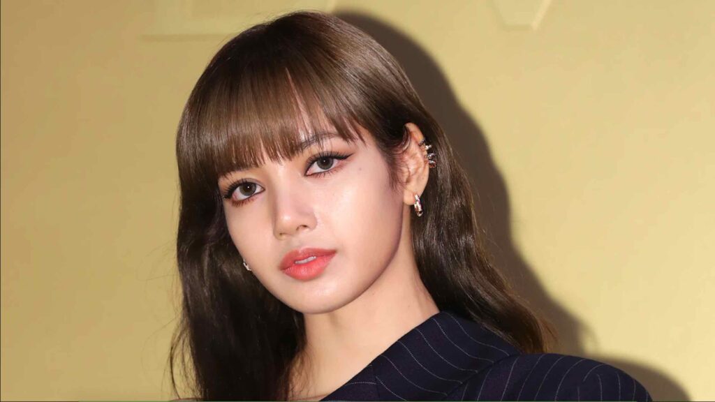 K-pop fans were quick to react this way when Lisa was pictured with BTS’ V at Paris Fashion Week. Except, is the couple actually dating? Find out here!