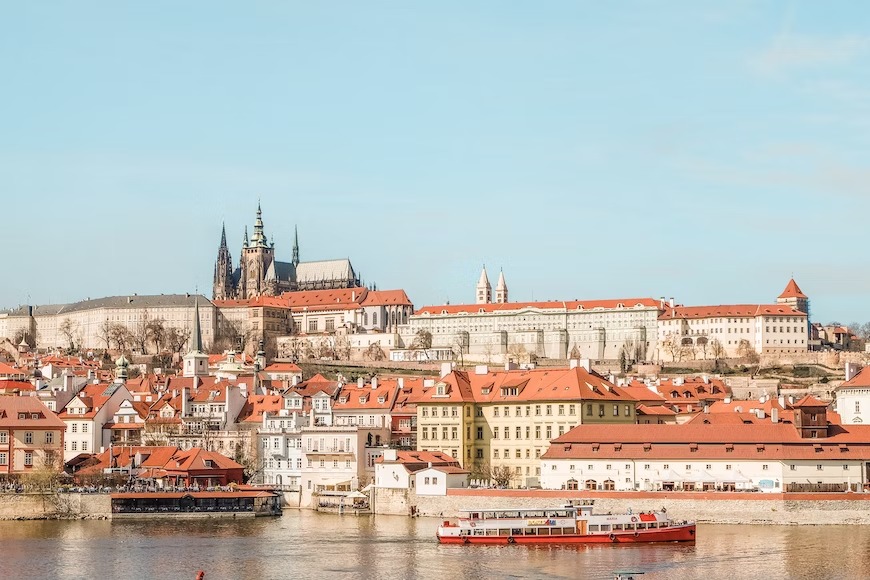 Alt-text: A water view of Prague, Czech Republic