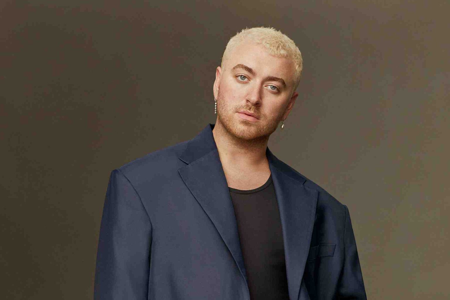 Sam Smith's punk runway strut at Paris Fashion Week stirred real buzz. But can they vamp their way to the Grammys or will their fashion disruption hit a sour note? Read on!