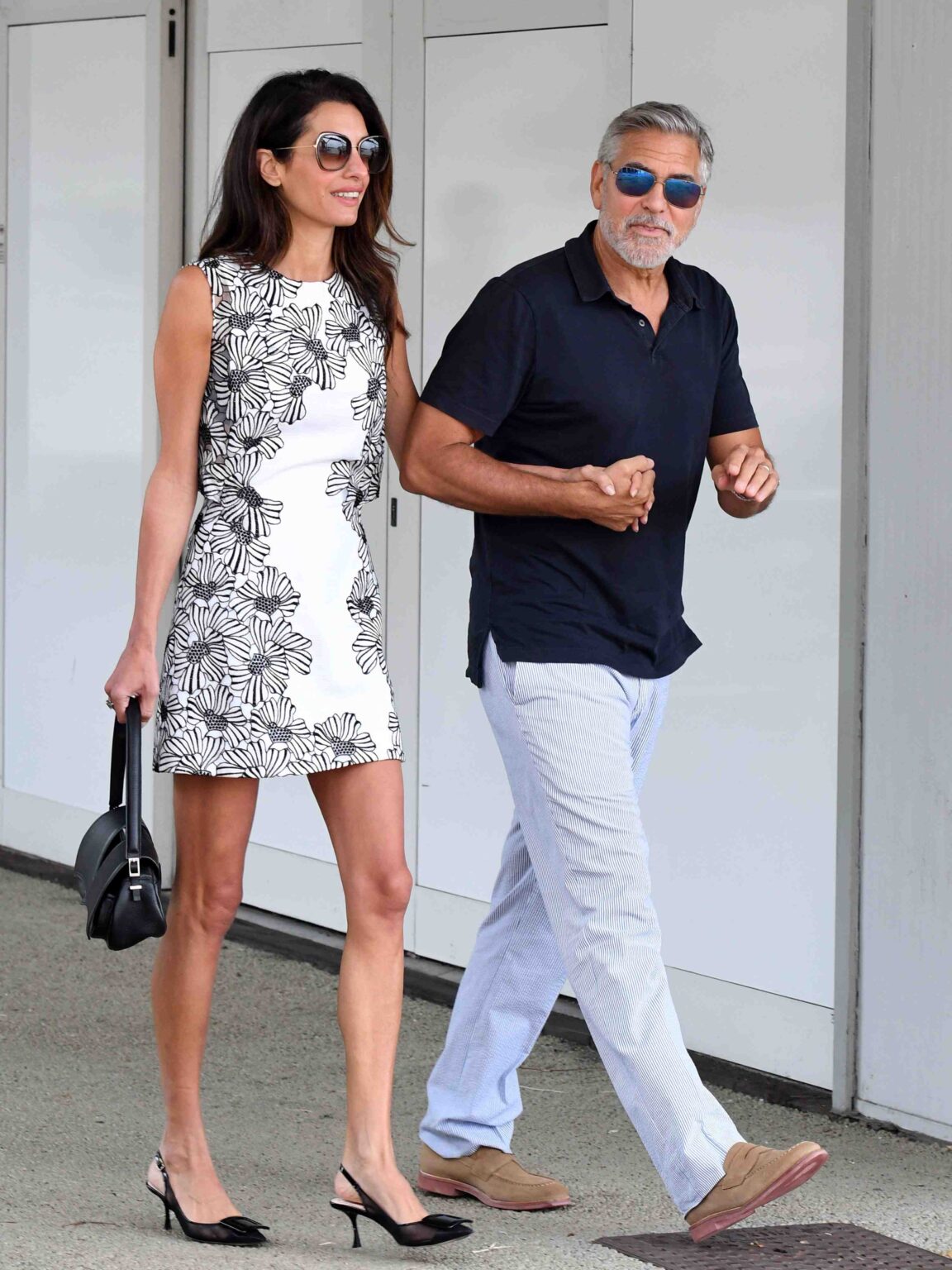 Unmask the "nude truth" about Amal Clooney in our titillating expose. Is a secret divorce from George Clooney imminent? Get the scoop on the sexy secret tearing Hollywood apart.