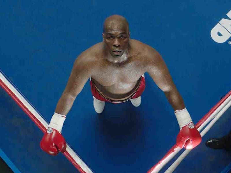 "Throwing knockout punches and flipping burgers, George Foreman turns up the heat! Dive into his victorious rise from ringside to kitchen royalty & discover a sizzling $300 million net worth."