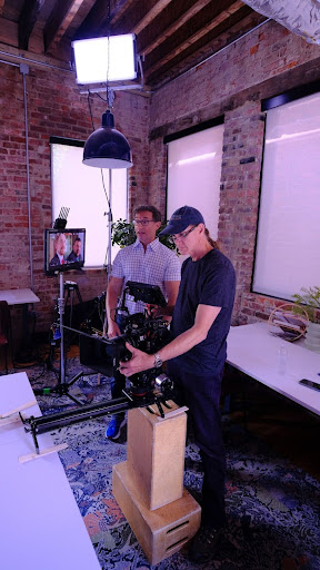 Brantley Davis directs a TV shoot on location, Richmond, Virginia. 
